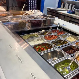 a buffet with a variety of food items
