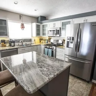 a kitchen with stainless steel appliances