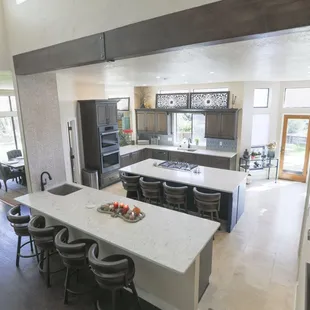 Custom kitchen with double islands, wet bar, double oven, and more.