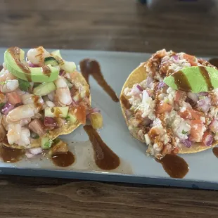 two nachos on a plate