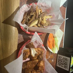 Tasty juicy wings in a dry rub Cajun coating with a side of habanero sauce.