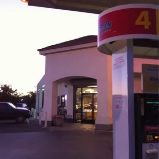 a gas station at dusk