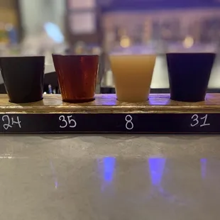 a flight of four different beers