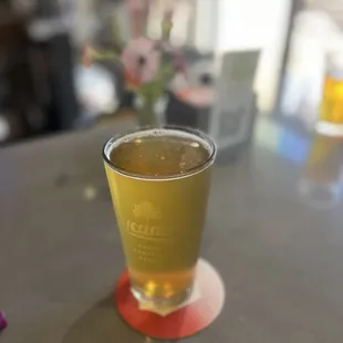 a glass of beer on a table