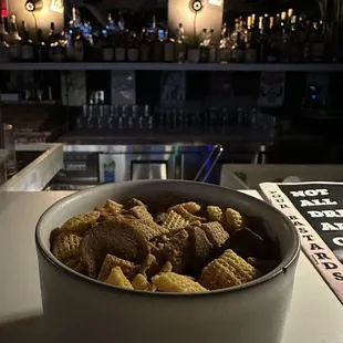 a bowl of cereal sitting on a bar