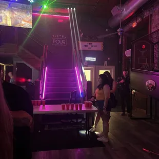 a group of people in a bar