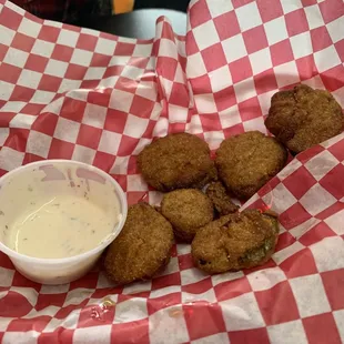 Fried pickle chips. Crispy and hot.