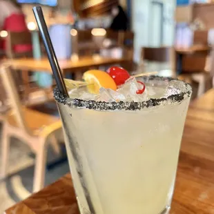 Road to Hana. Margarita with flavors of pineapple &amp; coconut. The black salt rim adds a bit of smoky, umami taste. Highly recommend.