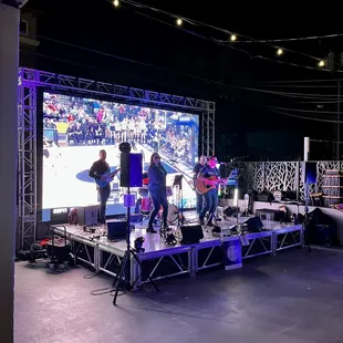 a band playing on stage