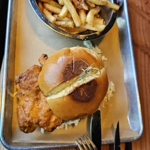 Buffalo Chicken Sandwich with fries.