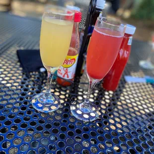 Peach and raspberry mimosa