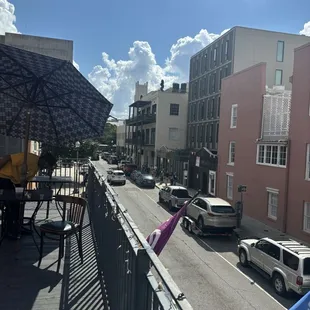 Balcony view! They have outdoor seating with umbrellas.