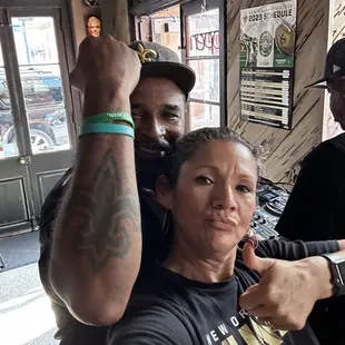 a man and woman taking a selfie