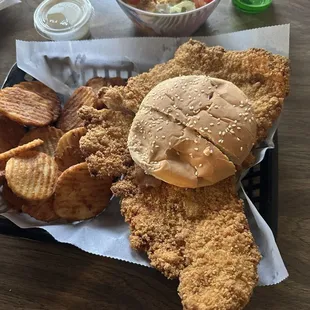 The pork tenderloin sandwich, dinner salad and buffalo chips.