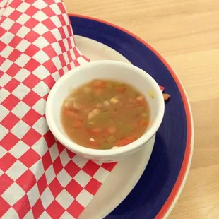 a bowl of soup on a plate