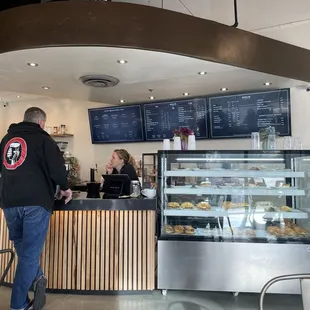 a man standing in front of a counter