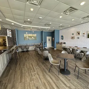 tables and chairs in a coffee shop