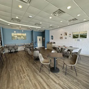 tables and chairs in a coffee shop