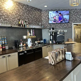 a bar with a television in the background