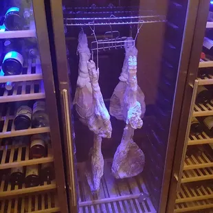 Hanging meat, chilling wine