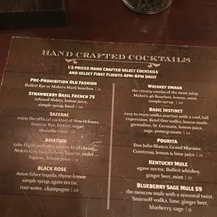The menu but it&apos;s misleading because not all cocktails are half price during happy hours