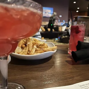 a glass of wine and a plate of food