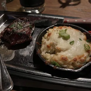 Filet mignon and cheesy potatoes