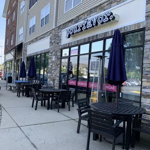 Out front of Pourfavor and some seating