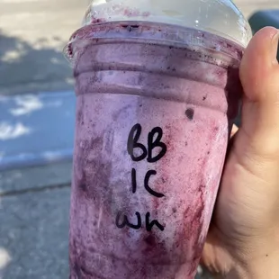 Blueberry ice cream smoothie with whipped cream