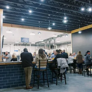 people sitting at the bar