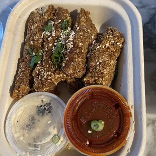 Chick&apos;n Fingers with Korean bbq sauce on side