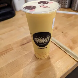 a cup of iced tea on a table