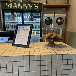 When you enter manny&apos;s? You go straight through those double doors on the right and you are inside powder room!