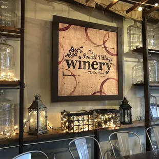 wine glasses and bottles on shelves