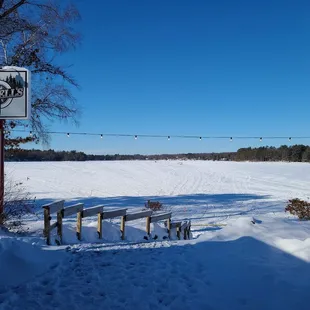 a bench in the snow
