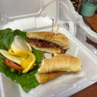 This is an $18 lunch.  It's supposed to be hot pastrami on rye. Does that look like ride to you?