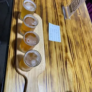 Flight of assorted beers brewed inhouse.