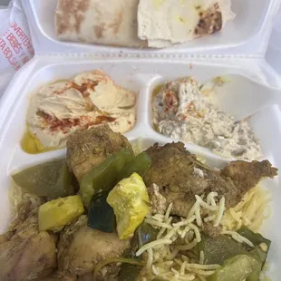 a meal in a styrofoam container