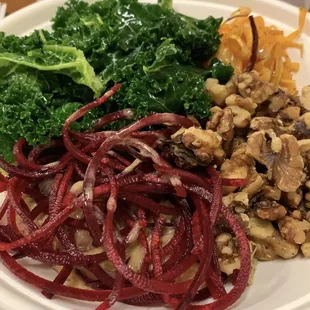 Roasted grain bowl with quinoa, beets, kale, butternut squash, walnuts