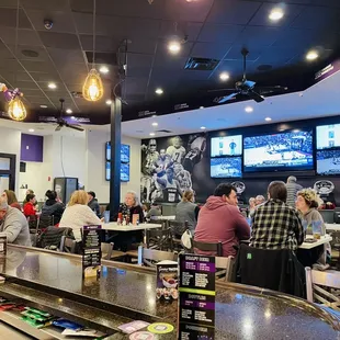 people sitting at the bar