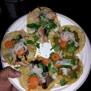 Pork tacos on left and lingua on the right. Gourmet grub!