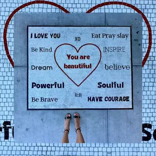 Outside - Tile mural on ground at walk-up window