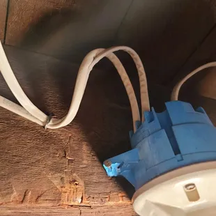 Another one of many pinched romex wires.  Staple was installed too tight. Loosened and it's OK now.