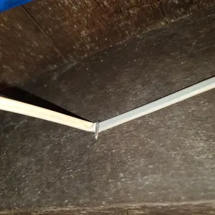 Another one of many pinched romex wires.  Staple was installed too tight. Loosened and it's OK now.