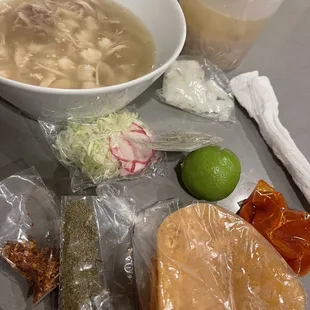 To go order. Delicious pozole with chicken