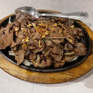 Charbroiled Pork at PPQ Dungeness Island in San Francisco.