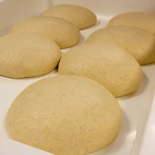 a tray of freshly baked pizzas