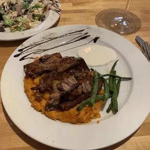 Brisket on top of sweet potato purée.