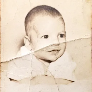 Neil E.