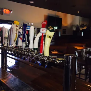 a row of beer taps